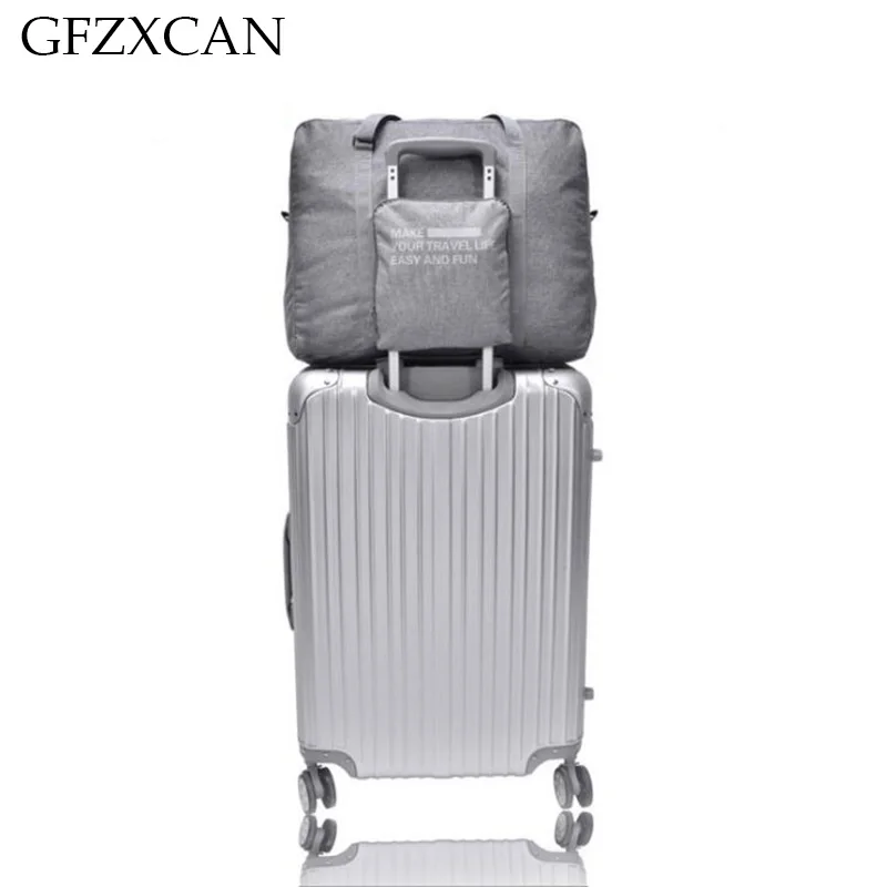 

Women's large-capacity fashion trolley case travel bag men's waterproof portable folding suitcase luggage bag