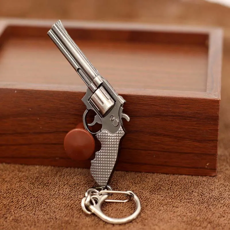 

Fashion Miniature Revolver Pistol Weapon fashion Model Keychain Key Rings New Mini Gun key Chain For Men Jewelry Surprise Gift