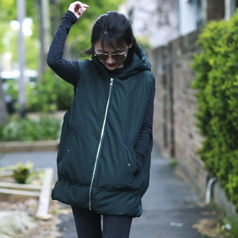 

V9903A rtistic hooded drawstring bracts loose in a long thick vest with a big clip