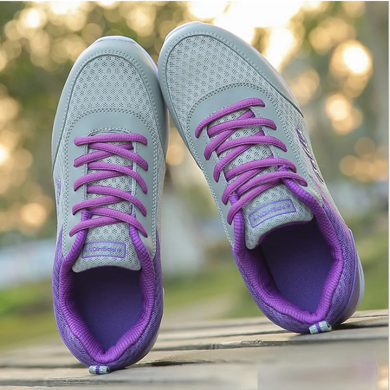 pink and blue running shoes