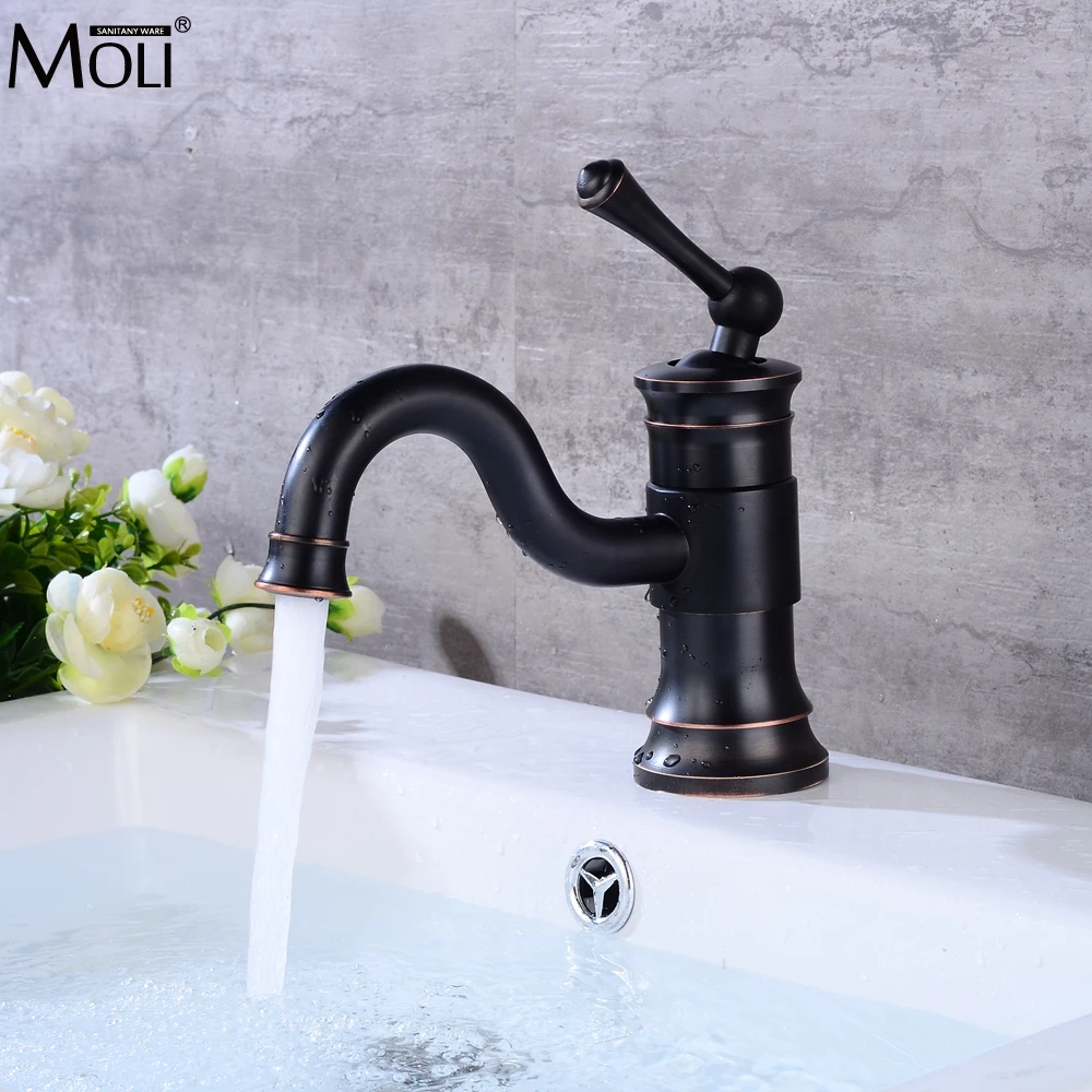 

Bathroom Basin Sink Faucet 360 Degree Swivel Oil Rubble Bronze American Style Hot and Cold Water Mixer