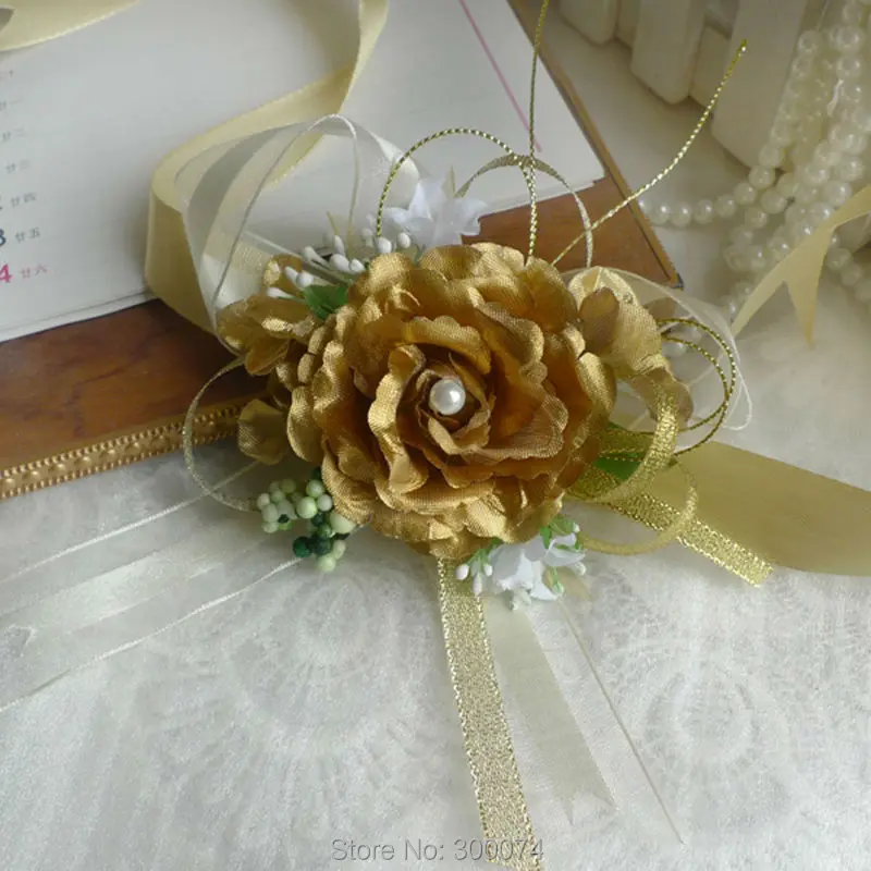 Gold flower corsage for hand