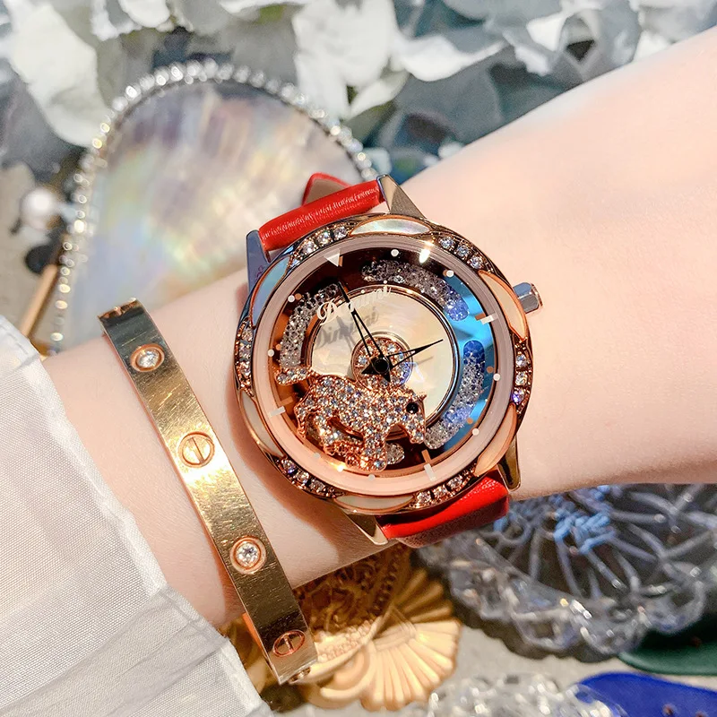

Rotating to run the watch female style temperament rotating buckle head watch female simple