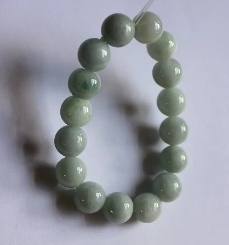 

1242 Untreated Light Green JADE Bead Bracelet