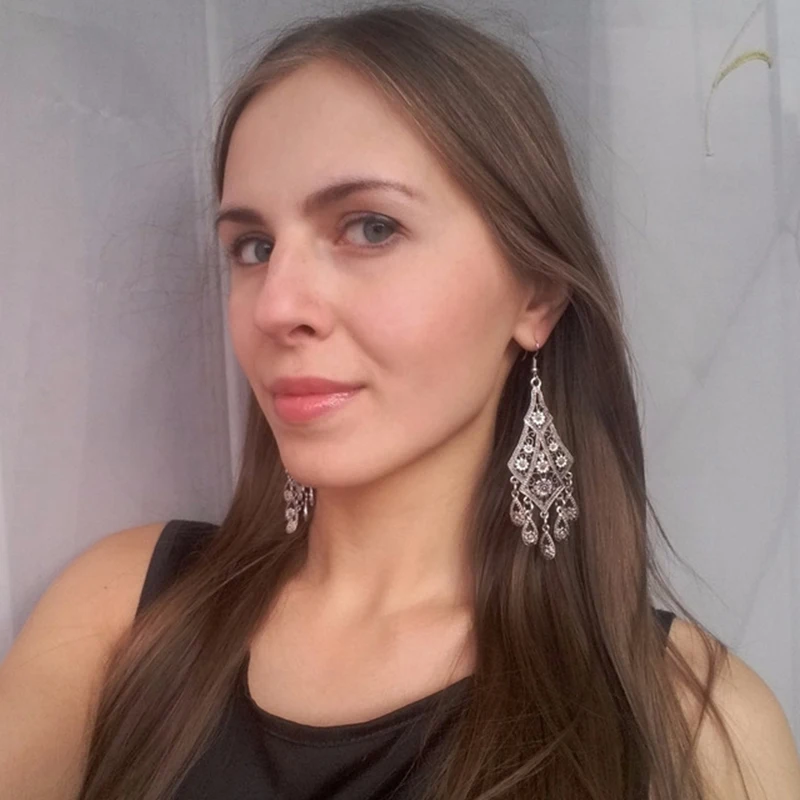 

LiuXSPVintage Water Drop Tassel Earrings Ethnic Carving Hollow Flower Metal Long Dangle Earring Women 2019 Fashion Brand Jewelry