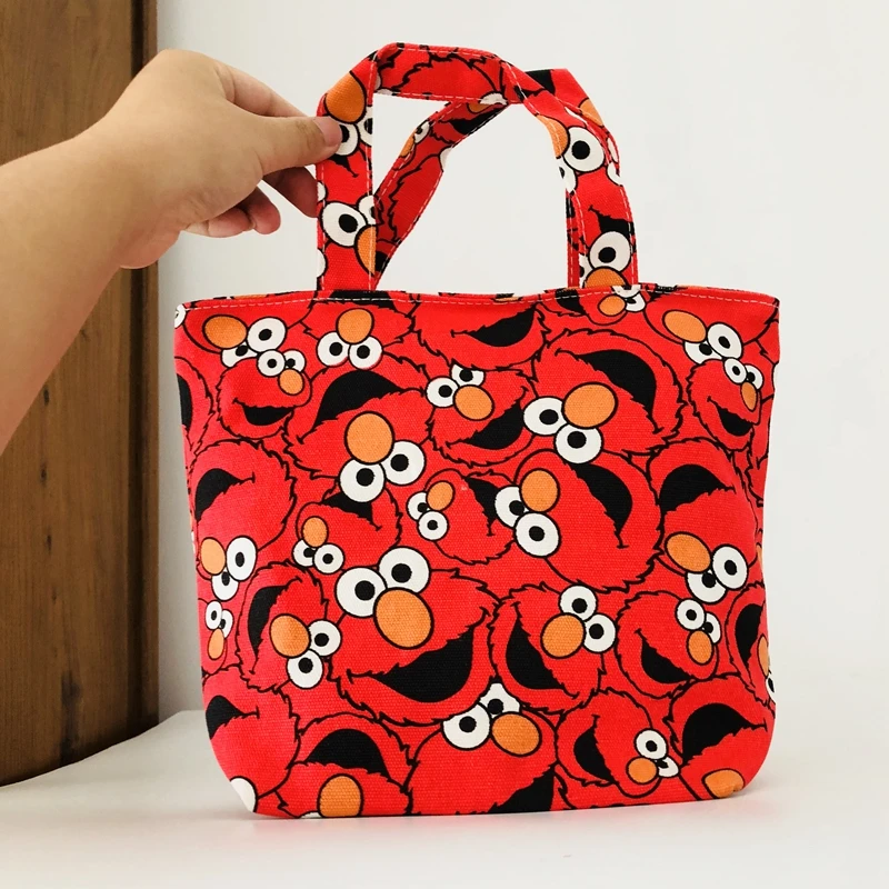 Us 4 93 29 Off Elmo Lunch Bag Cartoon Cute Bags Canvas Picnic Travel Storage Fashion For Women S Las Kids In From