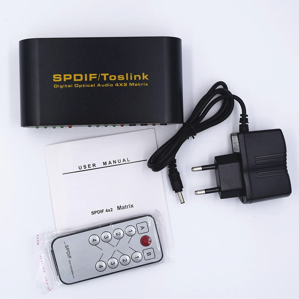 

Hot Sale SPDIF / TOSLINK Optical Digital Audio 4x2 True Matrix + Remote Control 4 Inputs 5V Power Adaptor