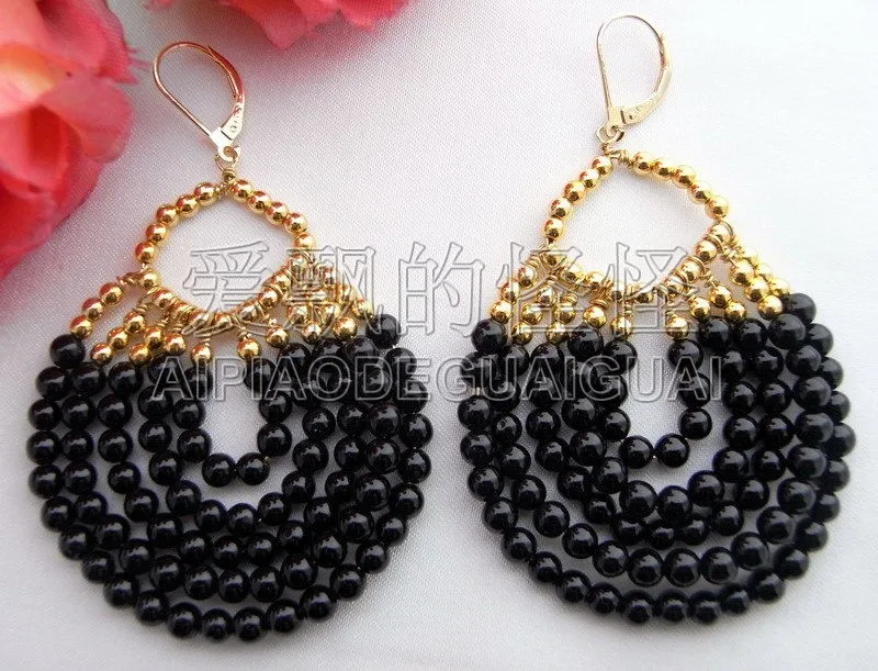 

Wonen's Black Onyx Golden Plated Leverback Earrings