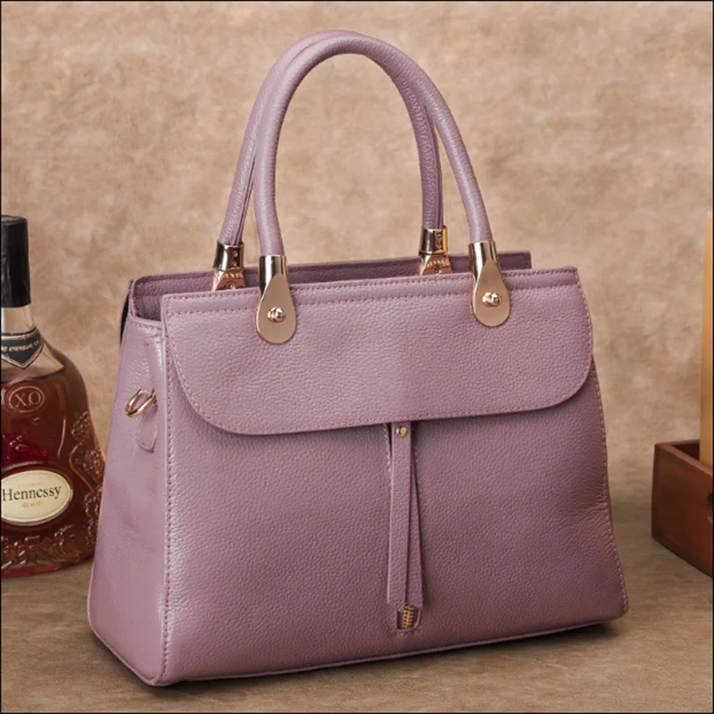 Beautiful romantic new lychee pattern women leather handbags fashion belt decoration fringed trend portable Messenger bag