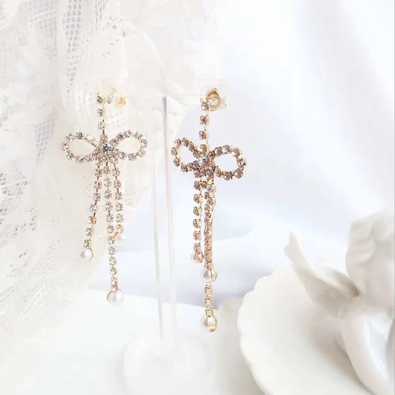 

MENGJIQIAO New Korean Sweet Full Shiny Rhinestone Bowknot Tassel Long Drop Earrings For Women Elegant Pearl Party Brinco Gifts