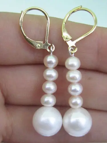 

A PAIR AAA 10-11MM SOUTH SEA WHITE PEARL EARRING 14k/20 GOLD