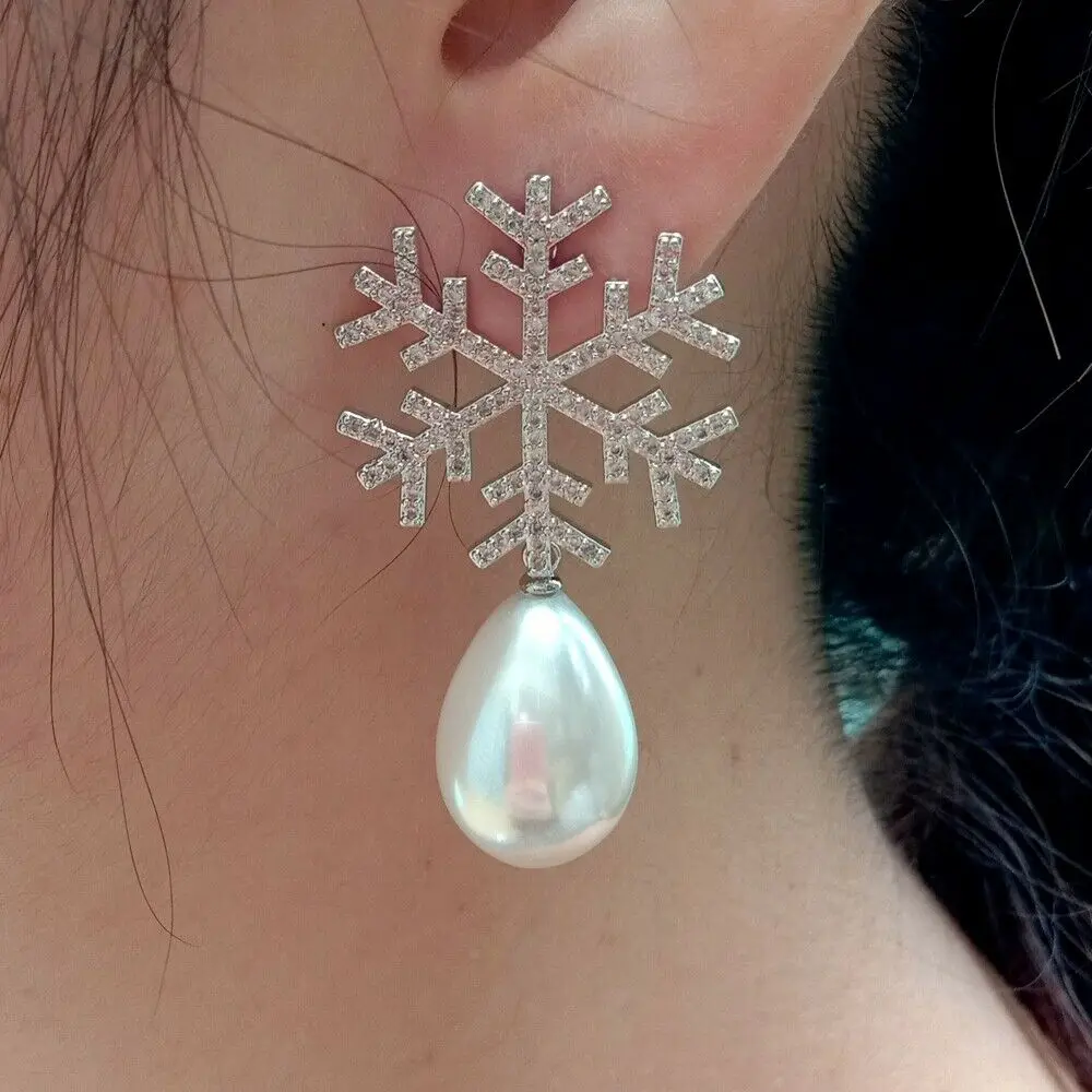 

Teardrop White sea Shell Pearl Cz pave Snowflake Earrings