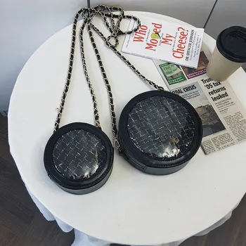 

2019 British fashion simple circular bag womenswear designer handbag high quality PU chain single-slant shoulder bag qq319