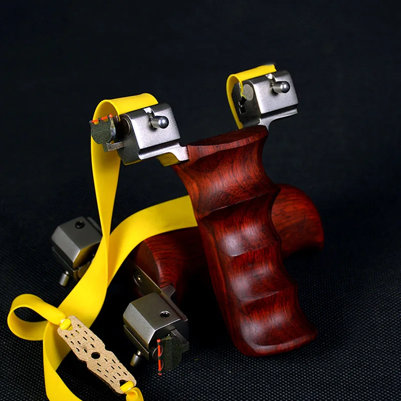 

Hunting Slingshot Stainless Steel Head Catapult Wood Handle Shooting 190g with Flat Rubber Band 2019 New