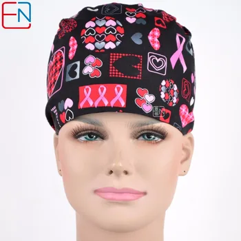 

women surgical caps in black with pink ribbons