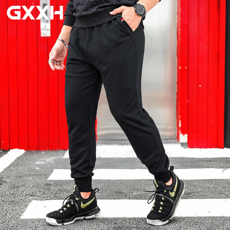 Большие размеры мужские свободные повседневные брюки весна и осень черные стрейч эластичные tide мужские однотонные брюки 2XL-5XL 6XL