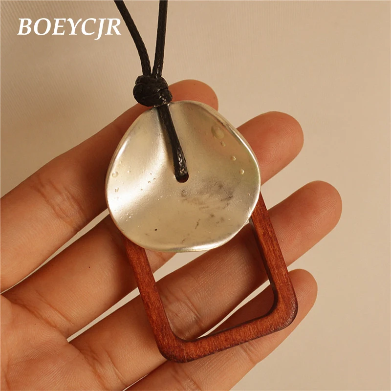 

BOEYCJR Vintage Hollow Square Wood & Alloy Pendant Necklace Rope Chain Fashion Jewelry Ethnic Pendant Necklace for Women 2019