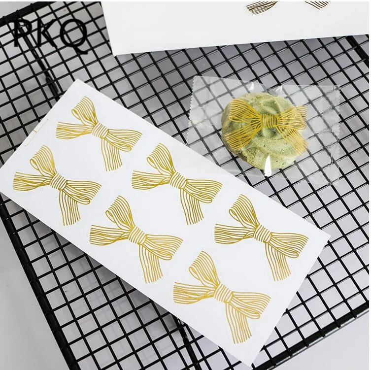 

60pcs Cute Golden Bow Adhesive Stickers Handmade Cake Sweet Candy Gift Packaging Sealing Label Sticker
