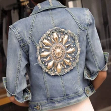 Новинка, женское весеннее Синее джинсовое пальто, короткое, дизайнерское, элегантное, сзади, с бриллиантами, заклепками, с дырками, в стиле пэчворк, тонкая верхняя одежда с коротким рукавом, куртка