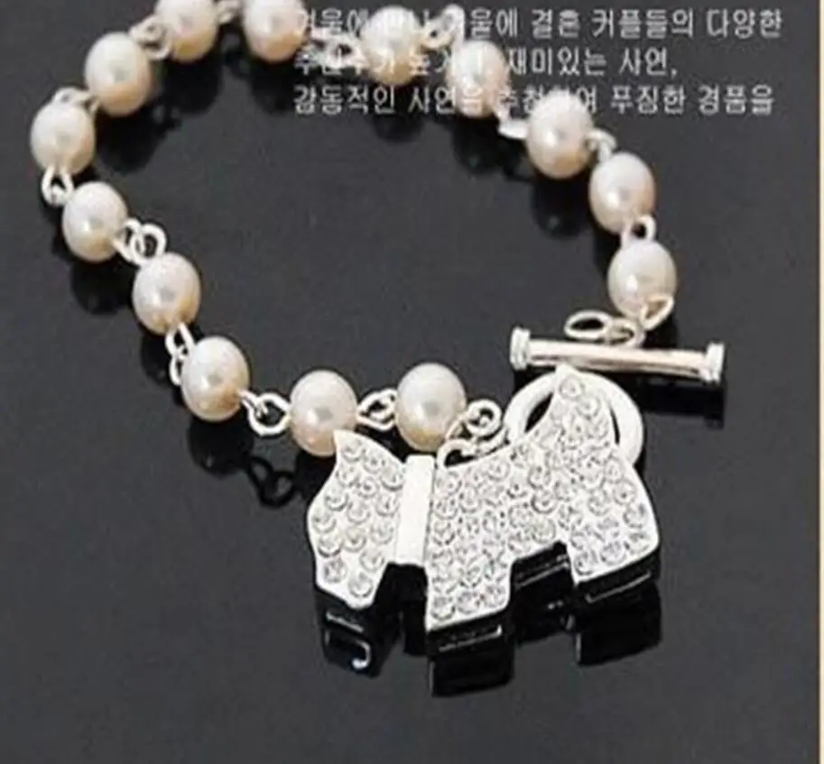 

OMH wholesale golden jewelry rhinestones shining pearl pup alloy bracelet SZ67