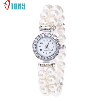 

Willby Fashion Lady Pearl Beads Rhinestone Elastic Bracelet Wrist Watch Women Quartz Dress Watches 170525