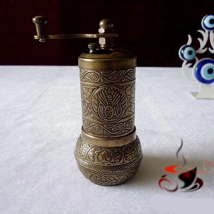 https://ae01.alicdn.com/kf/HTB1sqWOB8mWBuNkSndVq6AsApXai/Turkish-style-manual-coffee-spice-seasoning-grinder-all-metal-mini-table-grinder-Copper-Alloy-Relief-Pattern.jpg