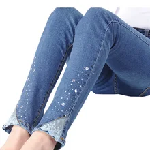 Обтягивающие женские брюки со стразами, кружевные брюки-карандаш в стиле пэчворк, модные женские джинсовые брюки с черепом, женские джинсы