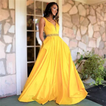 

Elegant Prom Dresses Yellow Illusion V Neckline Open Back Ball Gown Party Dress Vestidos De Festa Beaded Evening Gowns