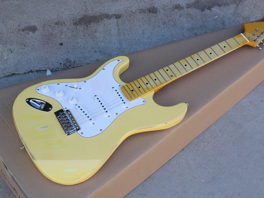 

Yellow Vintage Style Left Handed Electric Guitar with White Pickguard,SSS Pickups,Chrome Hardwares,offering customized services