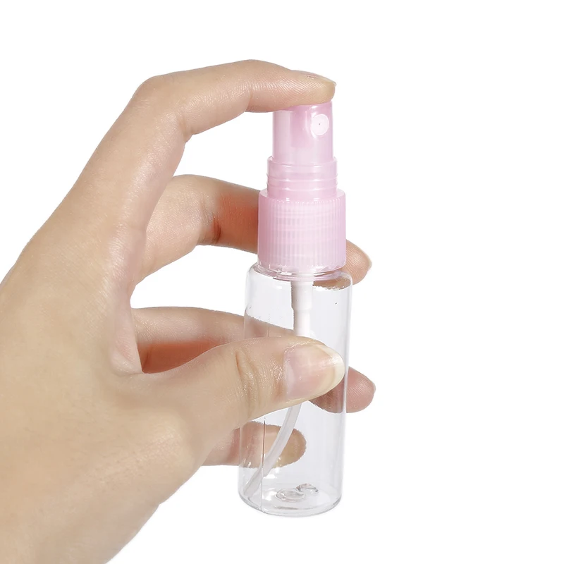 

1Pcs 20ml Mini Plastic Transparent Small Empty Spray Bottle for Make Up and Skin Care Refillable Random Color for Travel Use