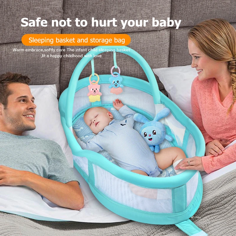 baby bed connected to bed
