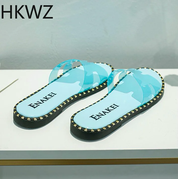

Slippers female 2019 summer new students wearing Korean version of the wild flat net red sandals and slippers beach wet water