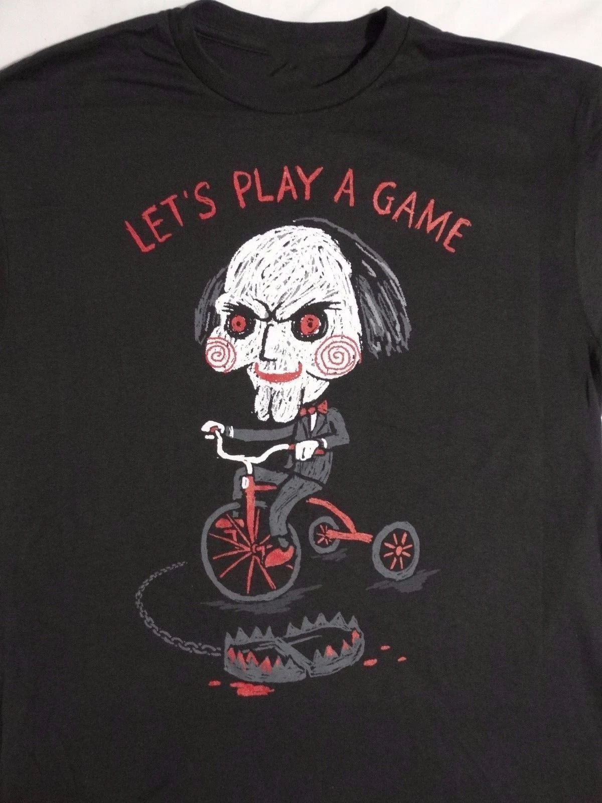 19 New Saw Horror Movie Jigsaw Puppet On Bicycle Lets Play A Game T Shirt Streetwear T Shirts Aliexpress
