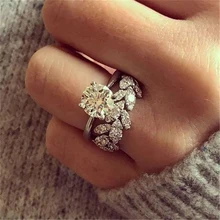 Iparam novo design brilhante redondo zircão flor feminino 2pc anel de luxo prata cor folha anel casamento zircão marca jóias