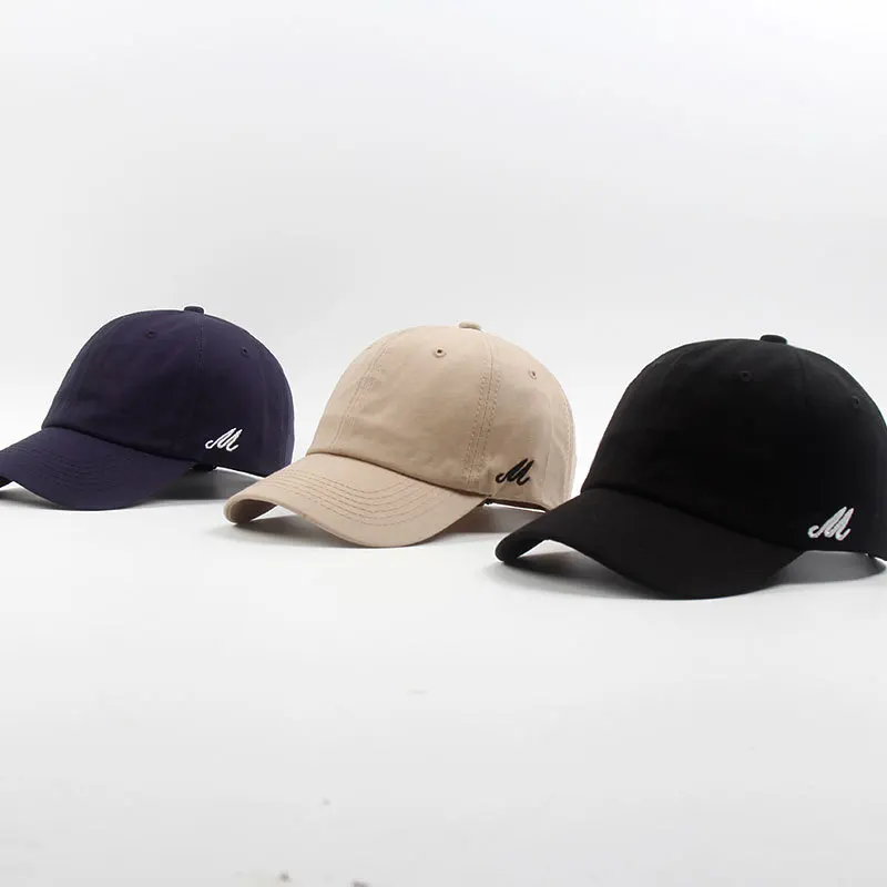 

New Korean version of the simple solid color side m letter baseball hat summer men and women curved hat casual visor cap