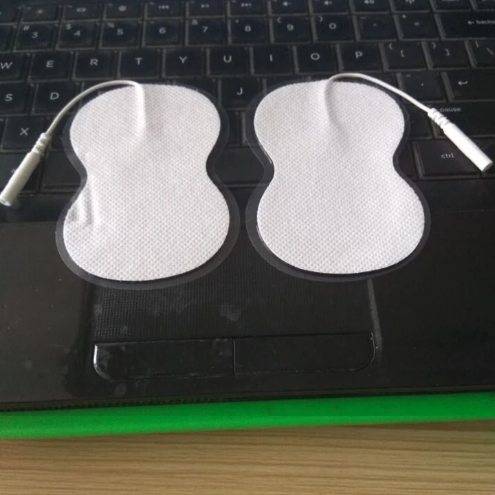 

20pcs non-woven with a line-type electrode patch TENS Electrode pad massager for 308B The pin hole is 2 mm