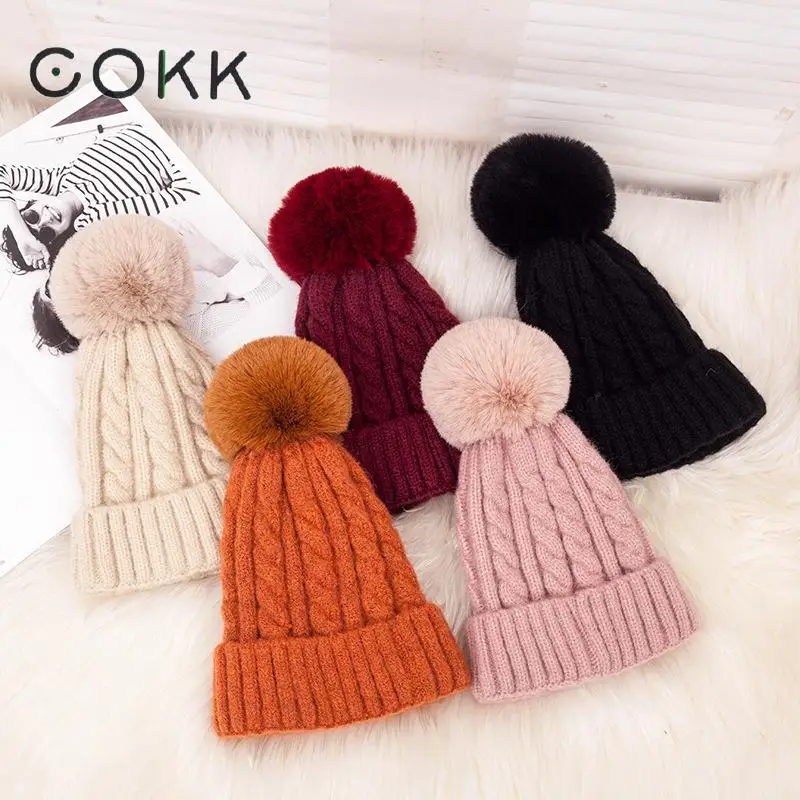 

COKK Pompom Hat Women Wool Knitted Winter Hats For Women Lady Outdoor Thick Warm Beanies With Faux Fur Ball Bonnet Gorras 2019