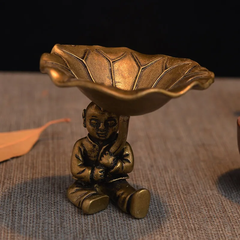 

Pure copper lotus leaf boy pot lid rack, table decoration decoration, craft collection.