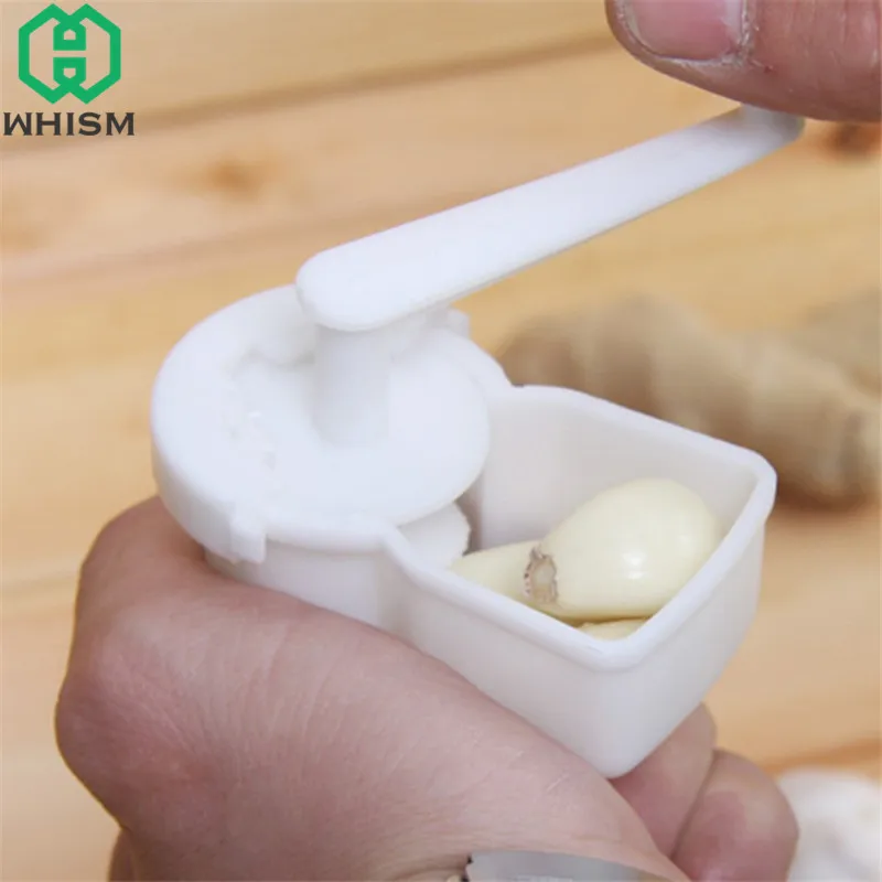 

WHISM Multifunctional Garlic Ginger Crusher Manual Rotate Grinder Press Plastic Garlic Twist Cutter Kitchen Gadget Cooking Tools