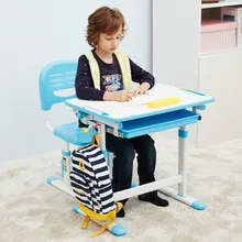 Children learning desk and chair set can adjust the height of correcting sitting posture students writing desks and chairs.