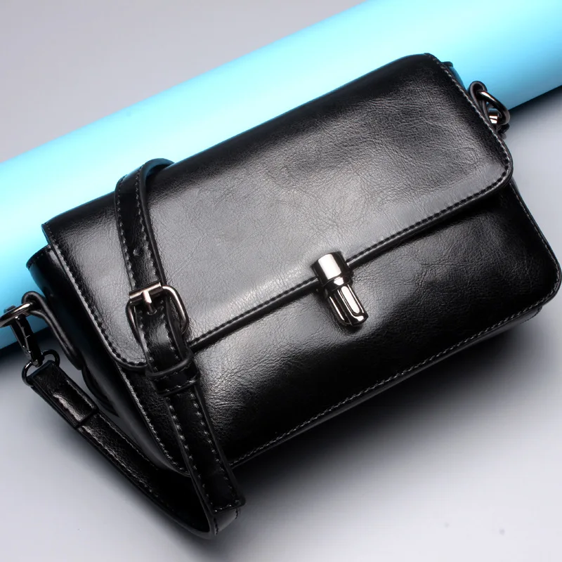 

Ms. Korean version of the new leather buckle small square package Ms. leather version of the square leather shoulder crossed bag