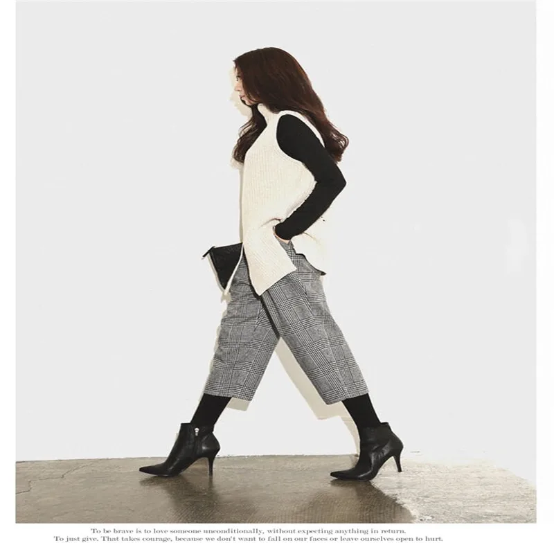 Autumn and winter high collar large size female wool vest Korean version of the sleeveless loose thick knit vest short pullover Autumn and winter high collar large size female wool vest Korean version of the sleeveless loose thick knit vest short pullover