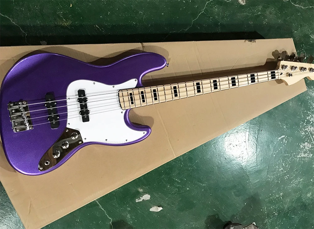 Metallic purple 4 strings electric bass guitar with white pickguard