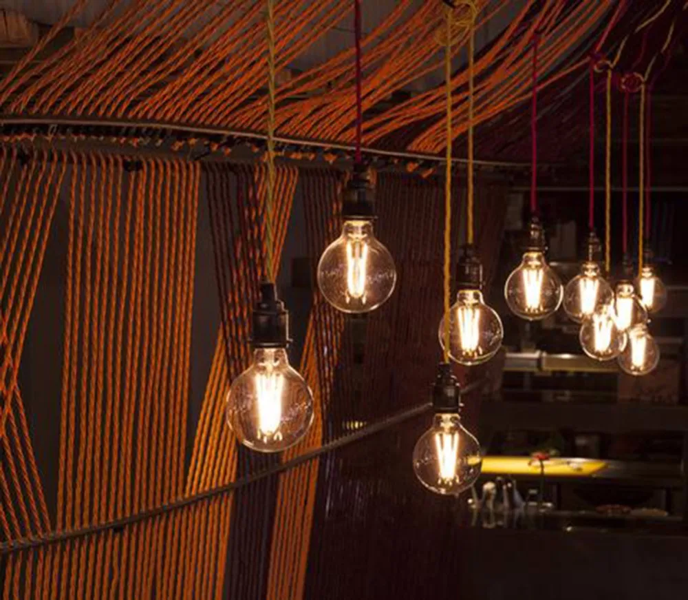 Bright_Goods_LED_filament_George_globe_light_bulbs_close_up_in_Nando_s_-_credit_photo_William_Pearce_large