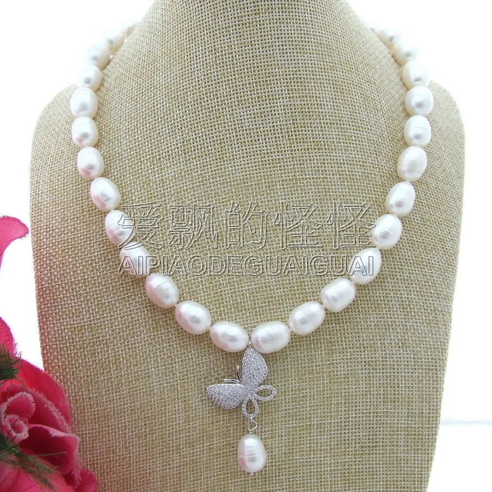 

N101909 18" White Rice Freshwater Pearl Necklace Butterfly CZ Pendant