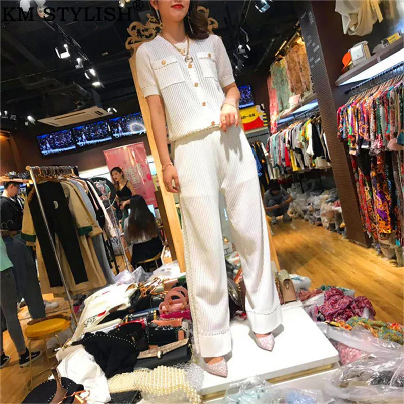 

2019 Spring and Summer Set Women's Short Sleeve Knitted Cutout Tops + Wide Leg Pants Black White Ice Silk Knitted Two-piece set