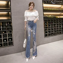 Новые осенние и зимние женские джинсы Модные расклешенные брюки с высокой талией женские рваные джинсы с цветочной вышивкой и кисточками