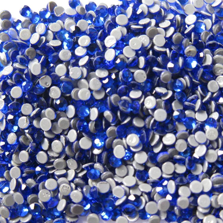 

wholesale high quality hot fix rhinestone,machine cut rhinestone,flat back crystal ss16 sapphire with 1440 pcs each pack