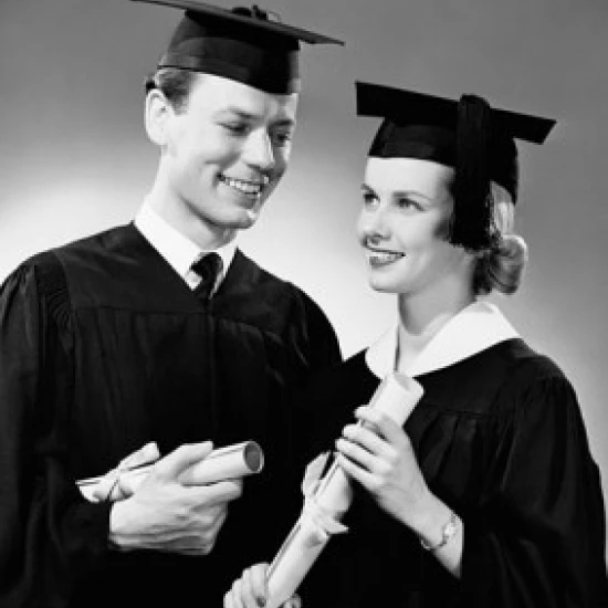 Two graduates holding diplomas and smiling Poster Print (18 x 24)