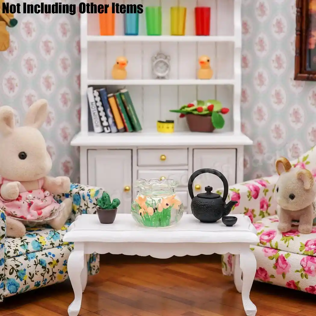 fish tank with dollhouse furniture